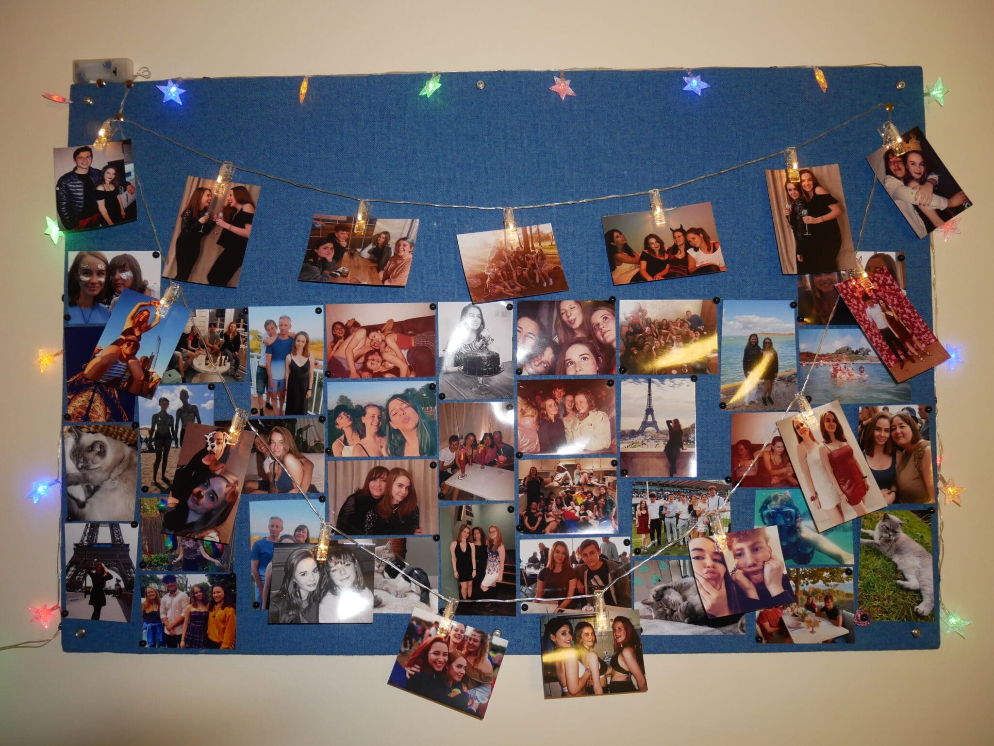 Print photos of friends and family to decorate your room with