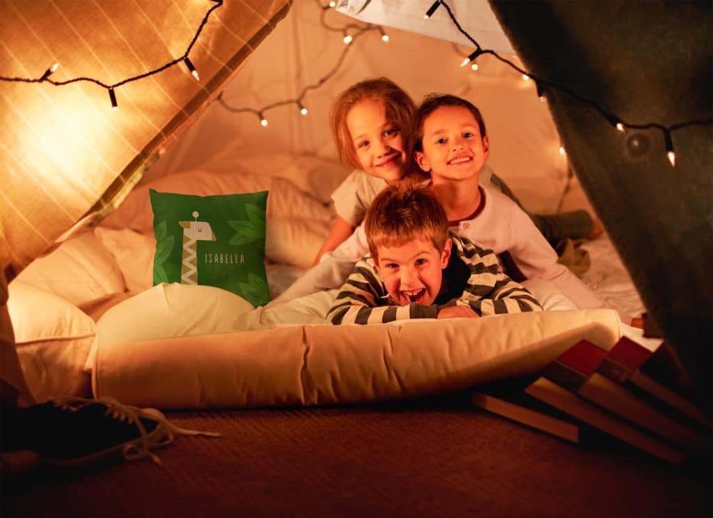 Create cosy back garden camp-outs with custom home decor gifts like cushions and blankets