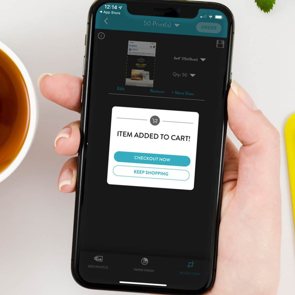 iphone x showing snapfish 'add to cart' prompt