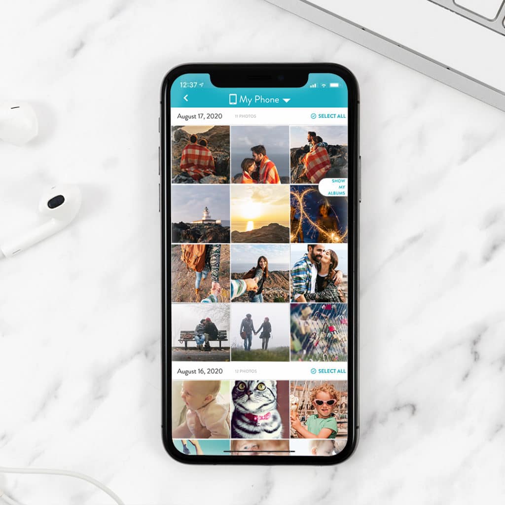 iphone x showing photo grid in snapfish app