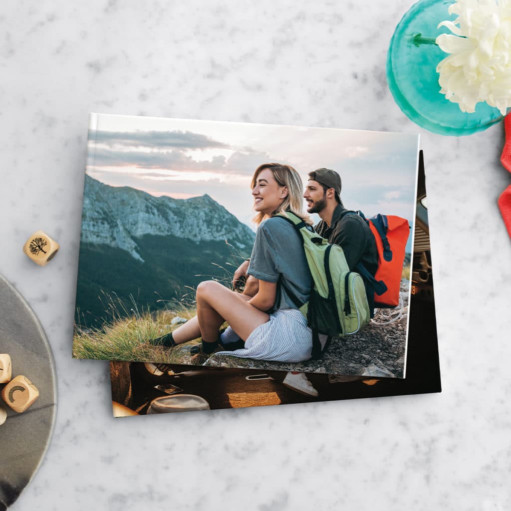 Print favourite holiday photos in a travel themed photo book