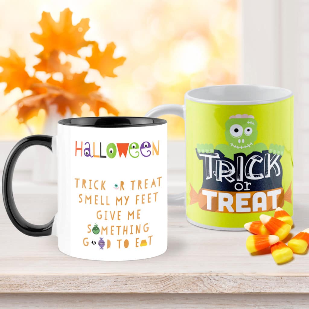 Fill personalized Halloween mugs with sweets for the trick or treaters