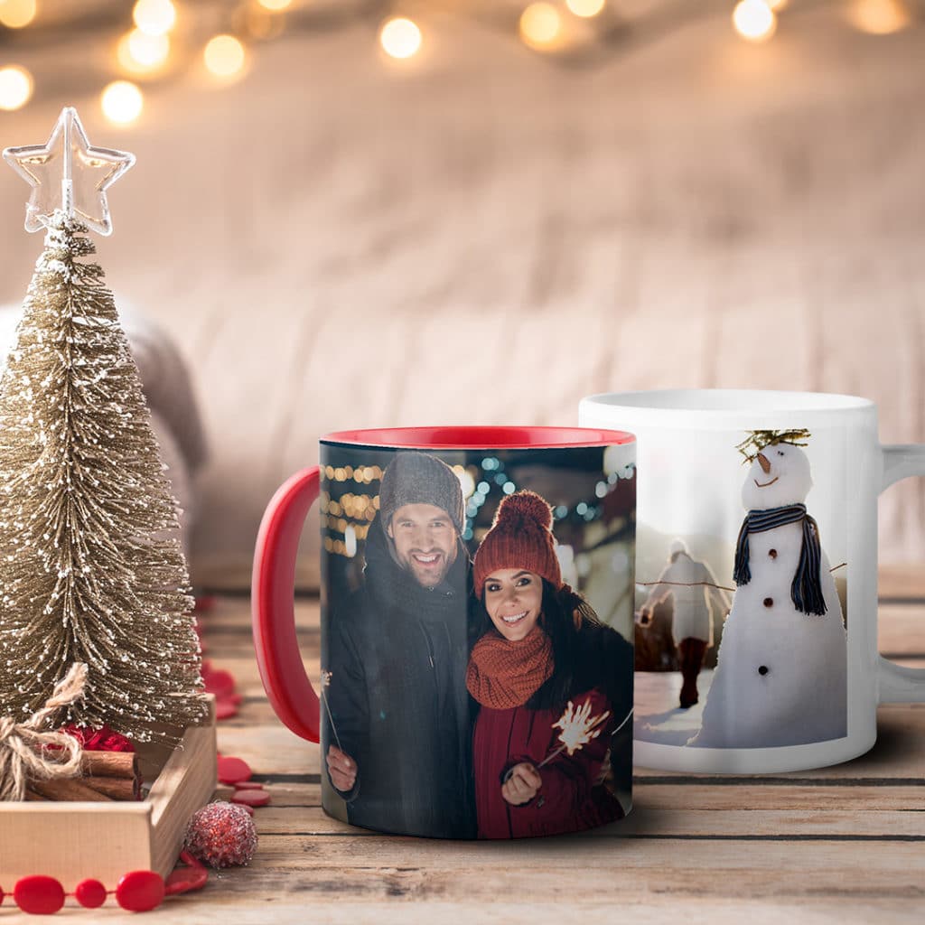 one red and one white photo mug on coffee table