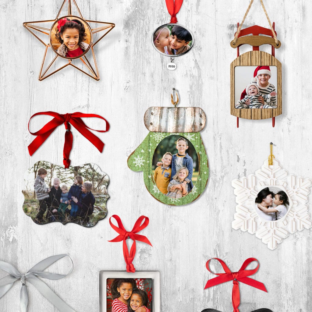 various photo ornaments pinned to white wall