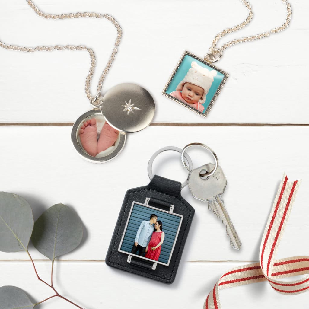 Small gift ideas for Christmas include custom keychains, photo jewelry and lockets