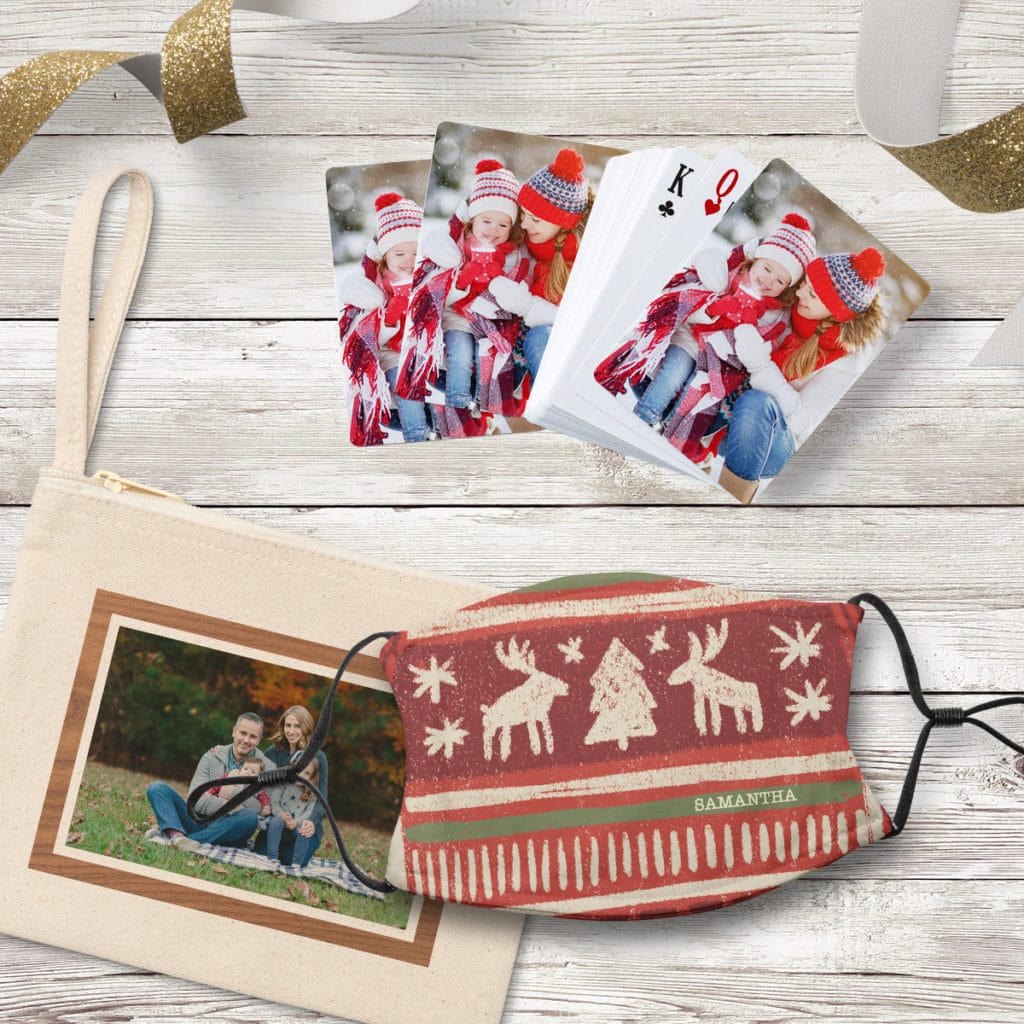 Small gift ideas for Christmas include custom make-up bags, playing cards and facemasks