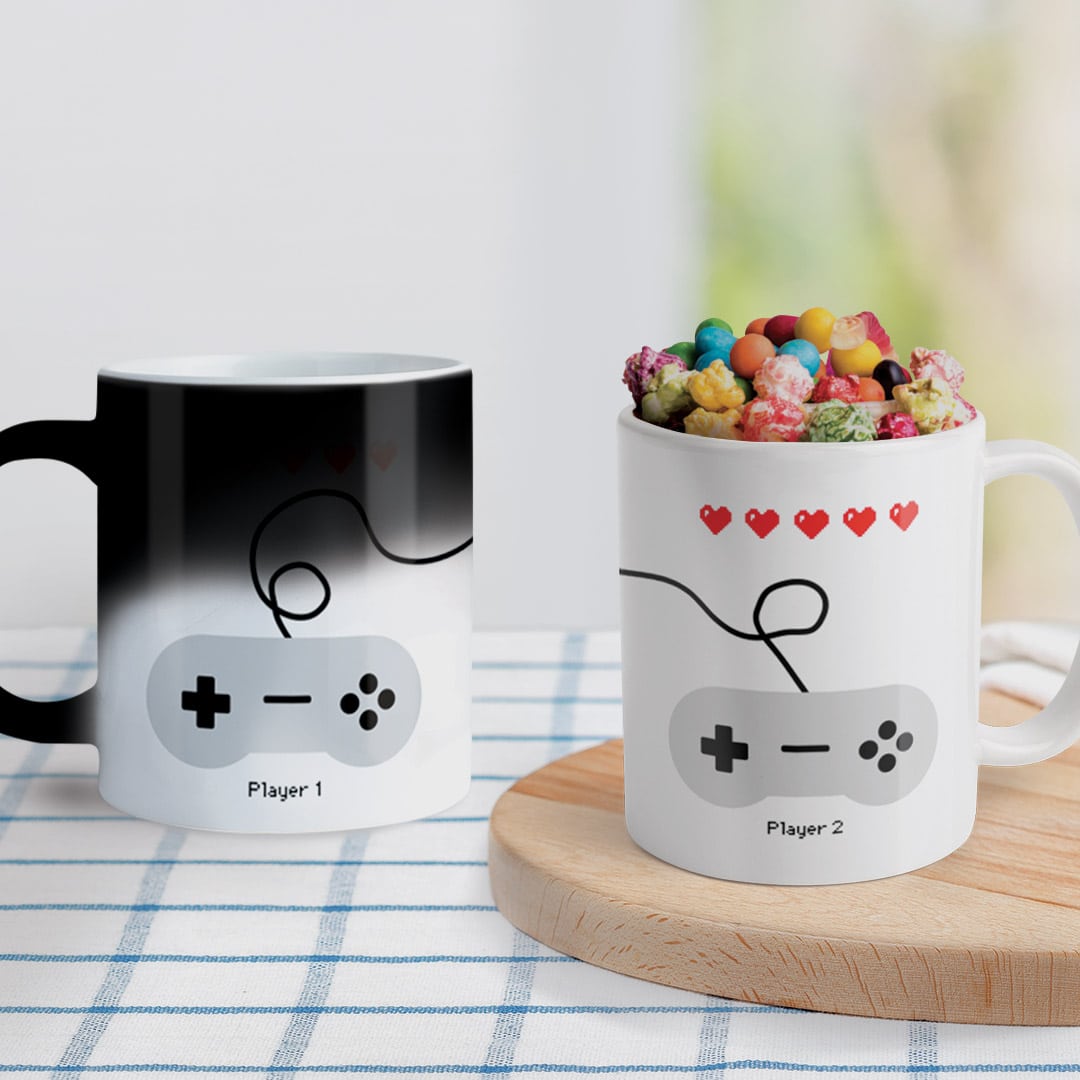 player one and player two personalised mugs, one with sweets inside