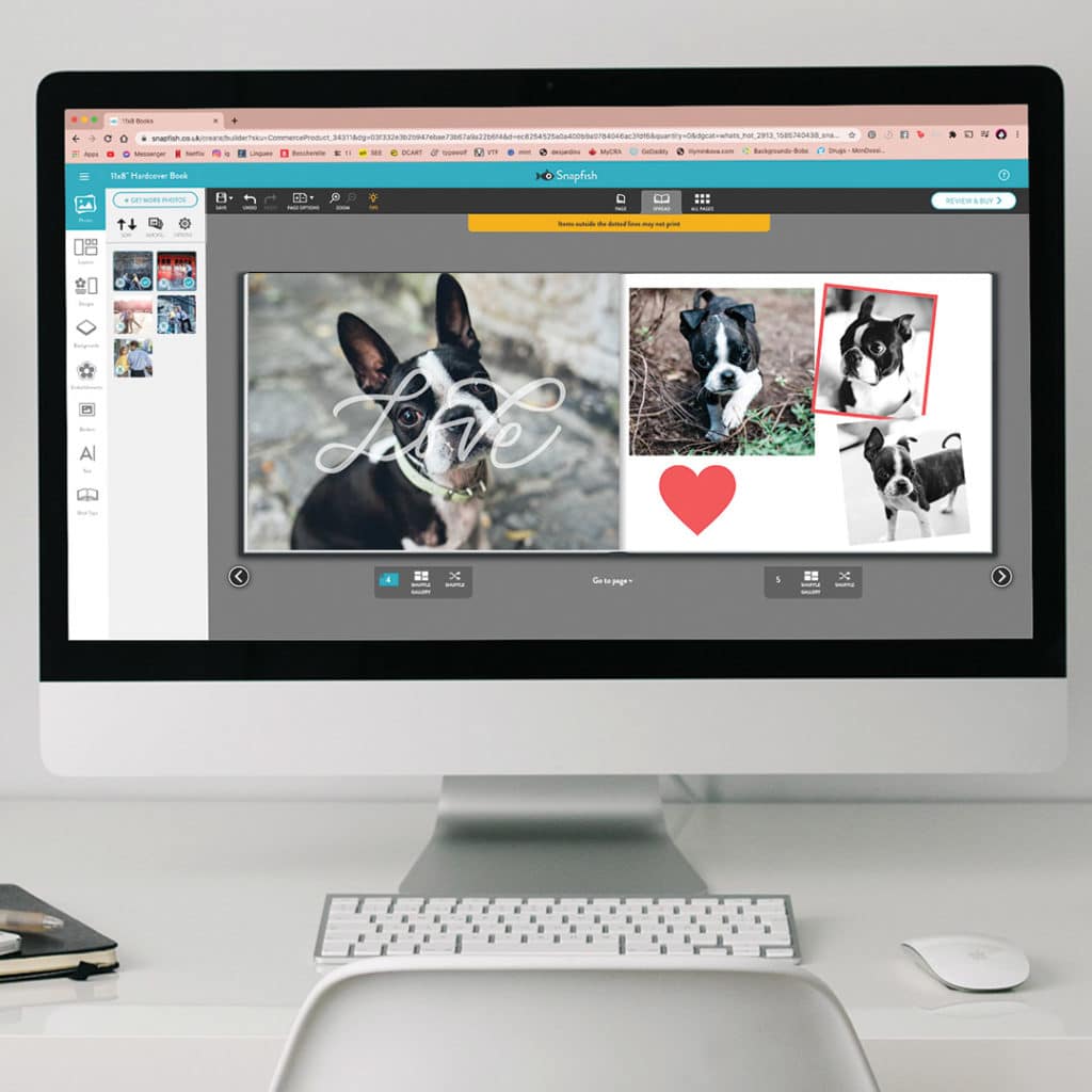 Photo builder with images of dog on a computer screen