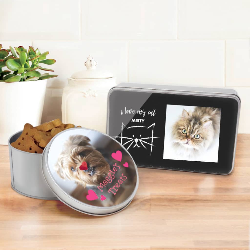 Metal tins with photos of dog and cat