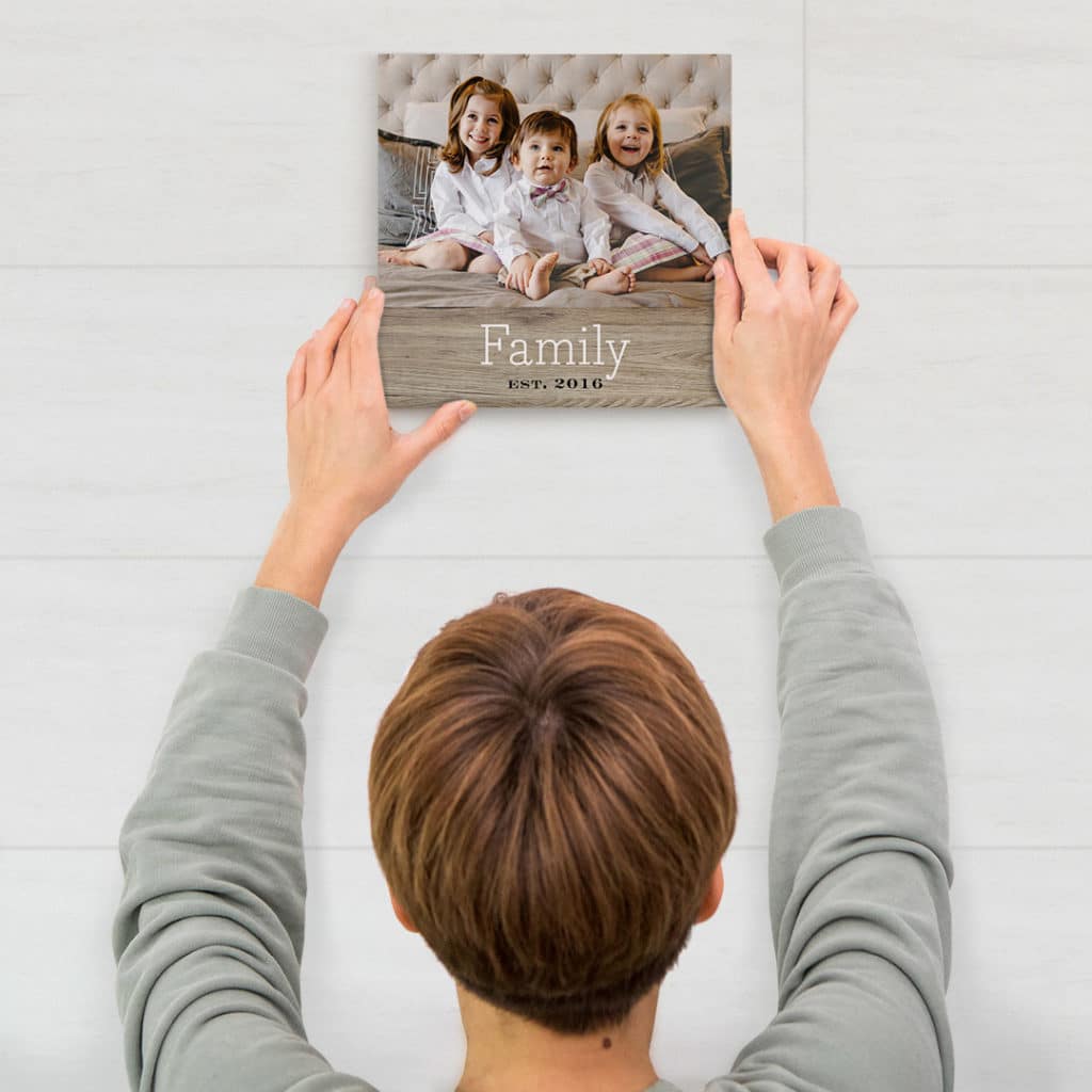 Just remove the backing from the self adhesive tabs and stick your photo tile to the wall. No mess.