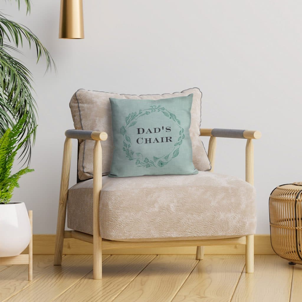 A photo cushion displayed on an armchair