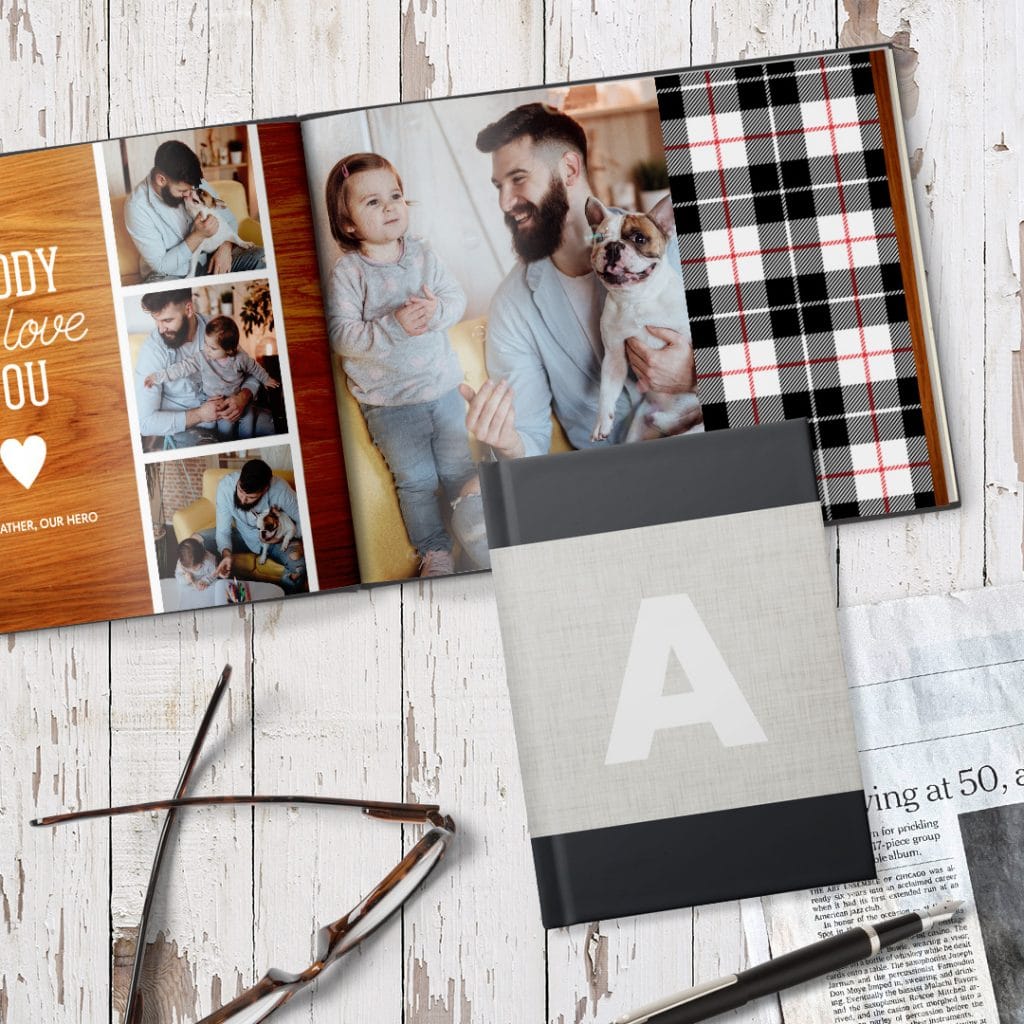 A photo book and notebook on a desk