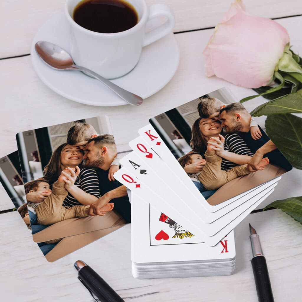 playing card deck with picture of family on back