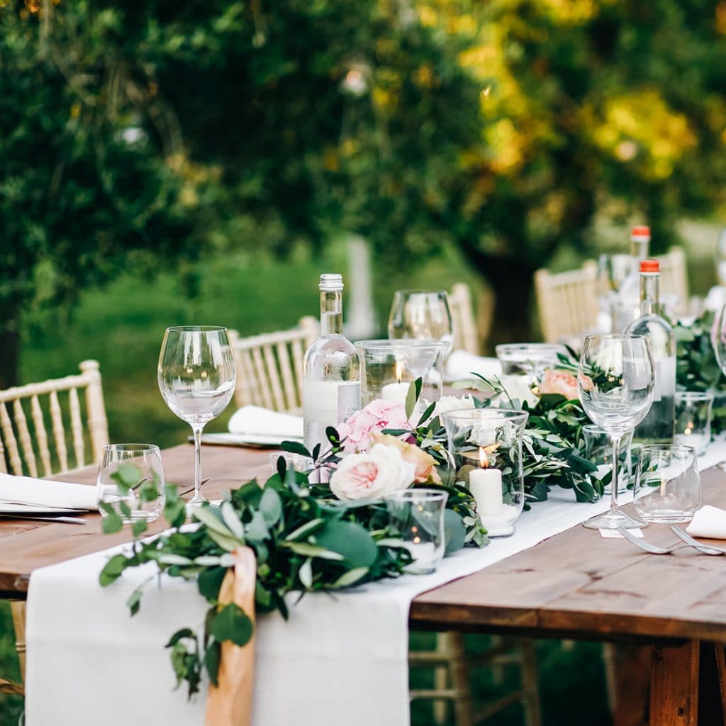 A table at a small outdoor wedding reception