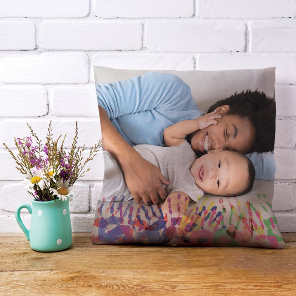 square photo cushion propped up against wall