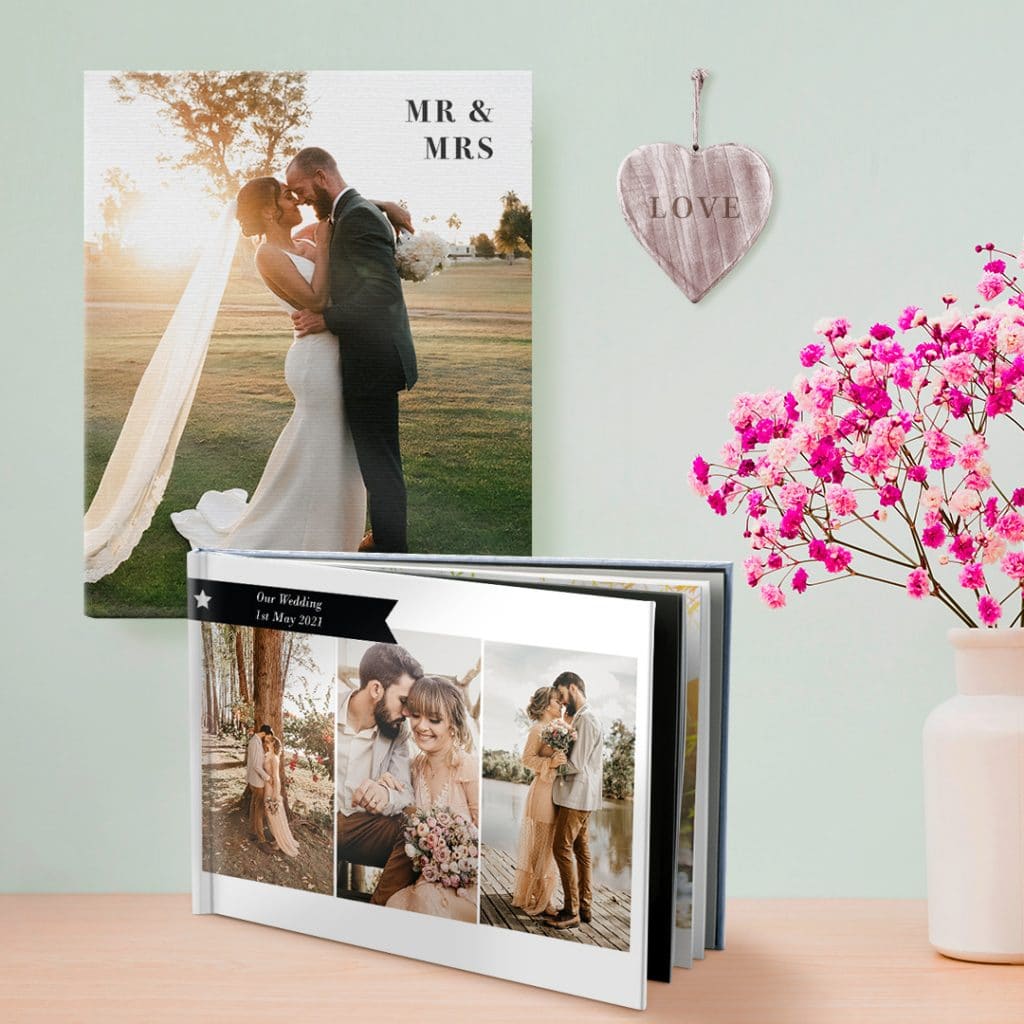 A wedding-themed photo canvas and photo book