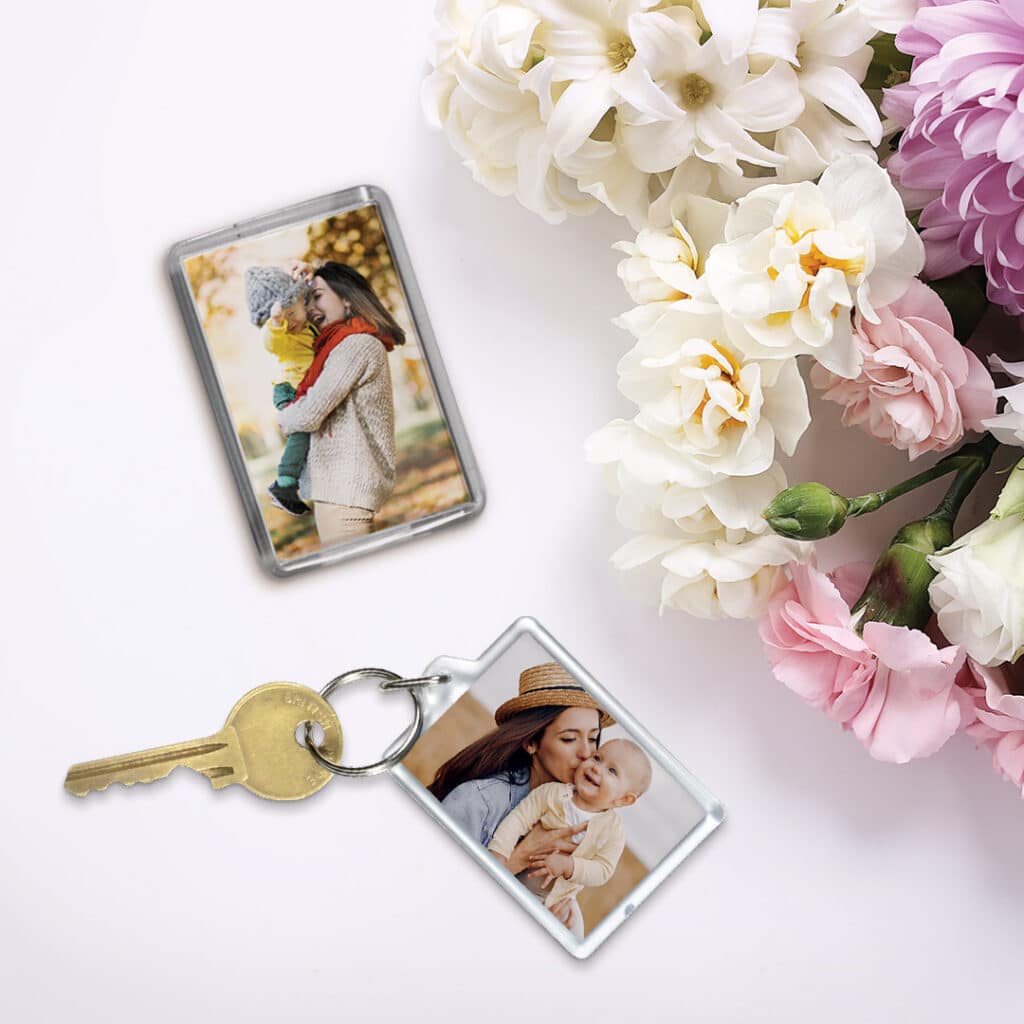 magnet and keyring next to flowers