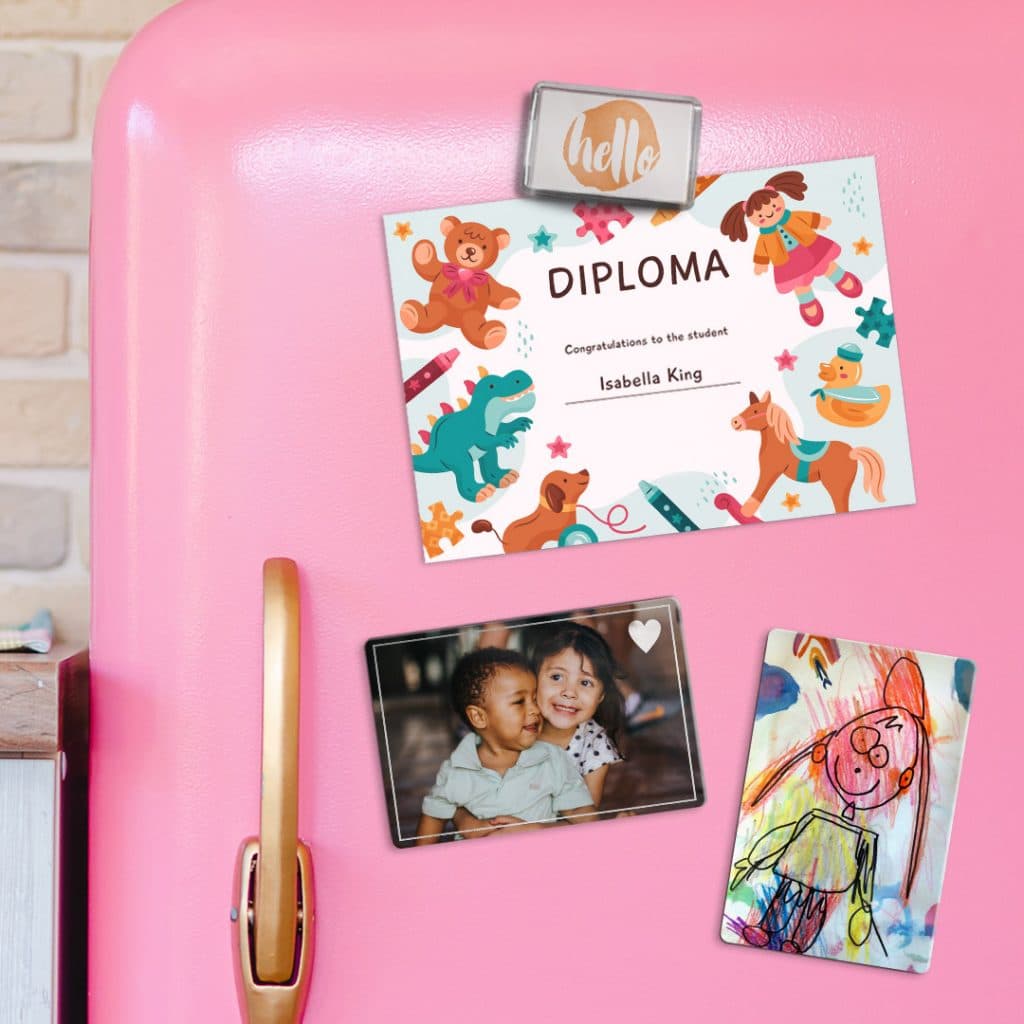 Create a kids achievement gallery wall on your fridge with magnets