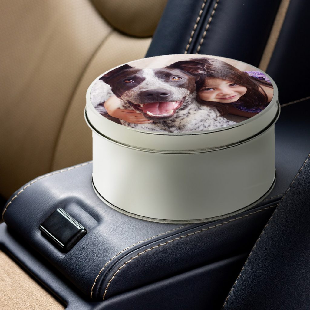 circular tin on car armrest