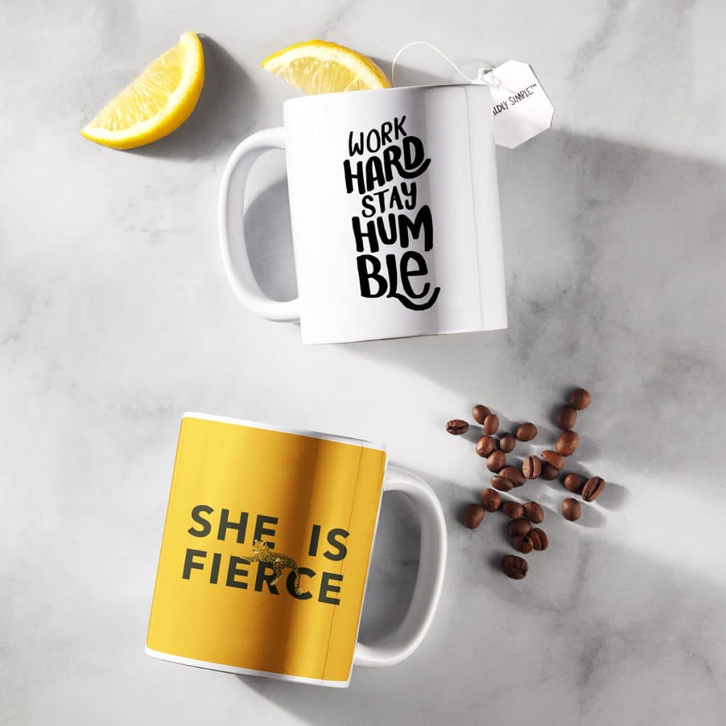 White coffee mugs showcasing inspiring quotes