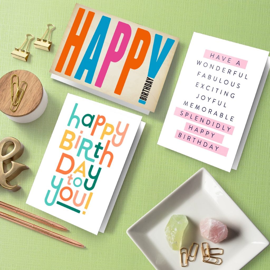 Folded birthday cards laying on a desk
