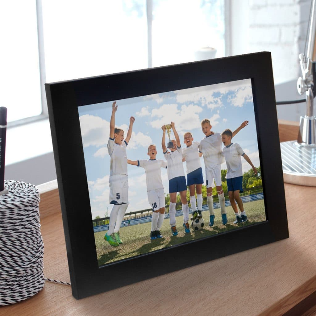 A framed photo print on a desk makes a great teacher thank you present