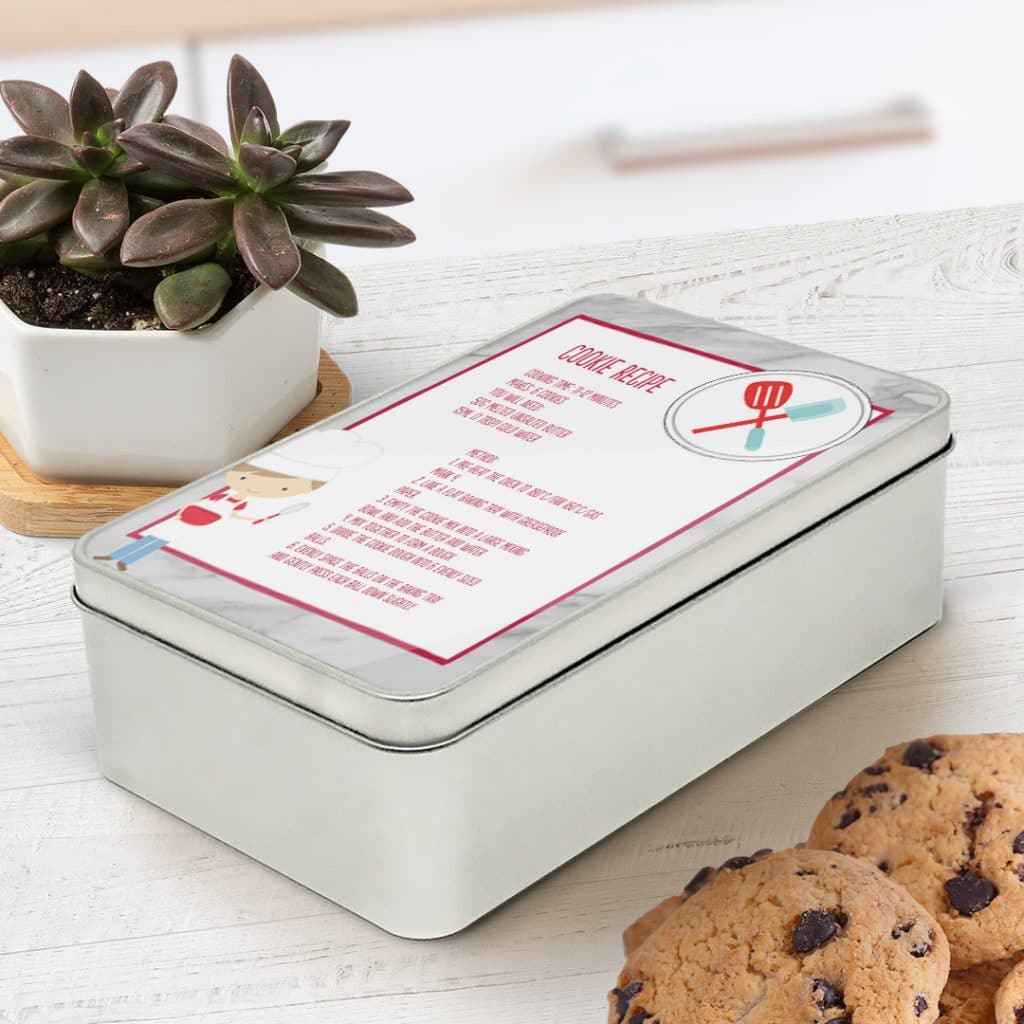A rectangular tin displaying a cookie mix recipe as thank you gift for the teacher