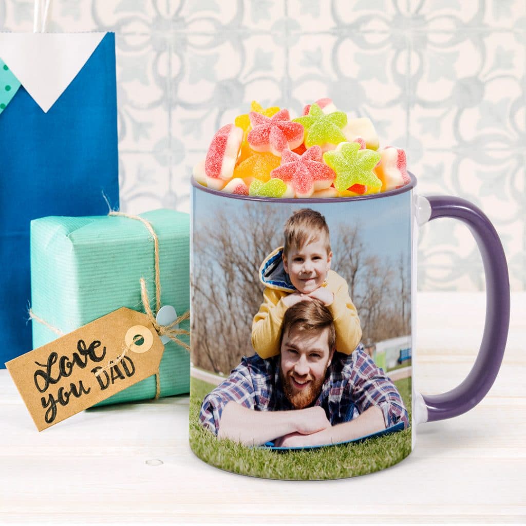 Make a purple photo mug and fill with gummy sweets as a gift for Dad. Make on the app in minutes