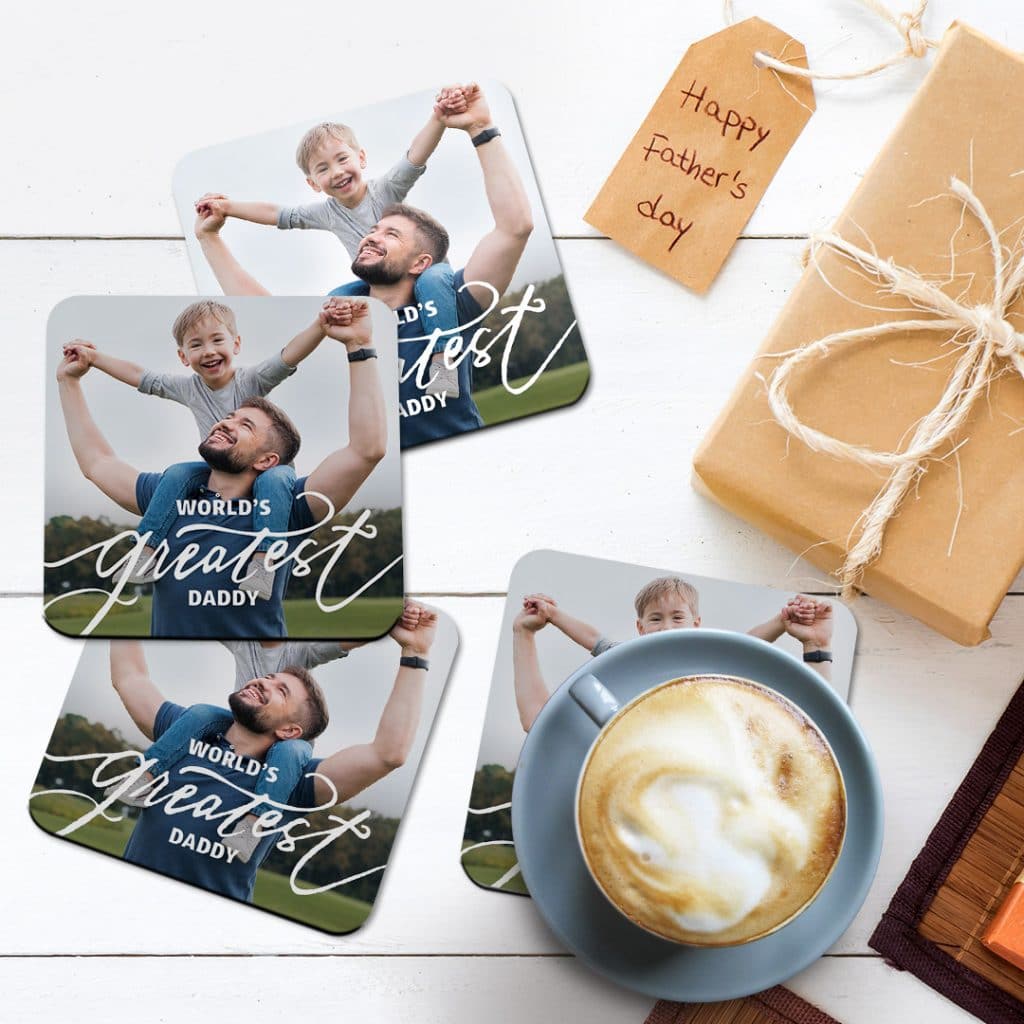 World's Greatest Dad coaster design with father and son photo with coffee mug placed on top