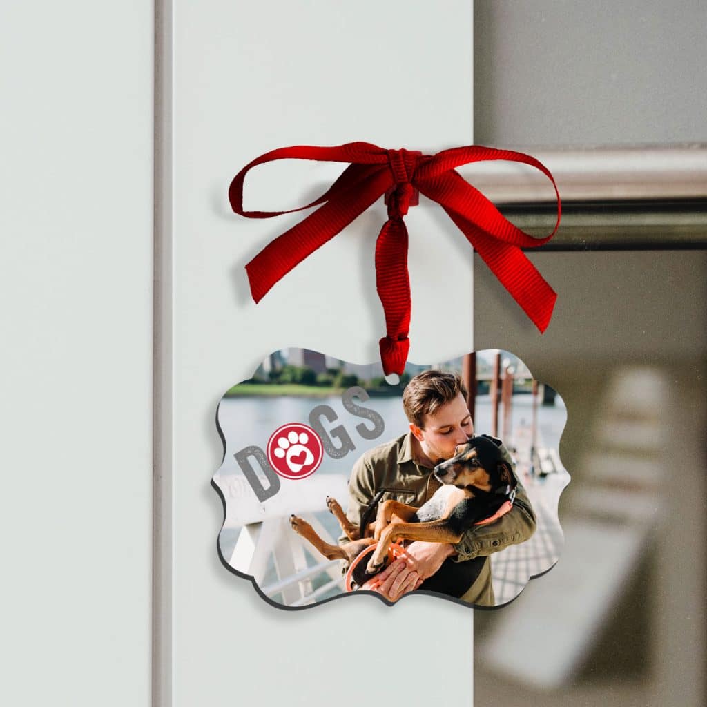 Christmas ornament on door handle, printed with photo of Dad and pet dog