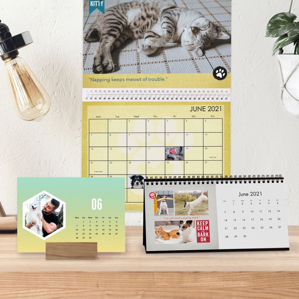 different format of Snapfish photo calendars on desk