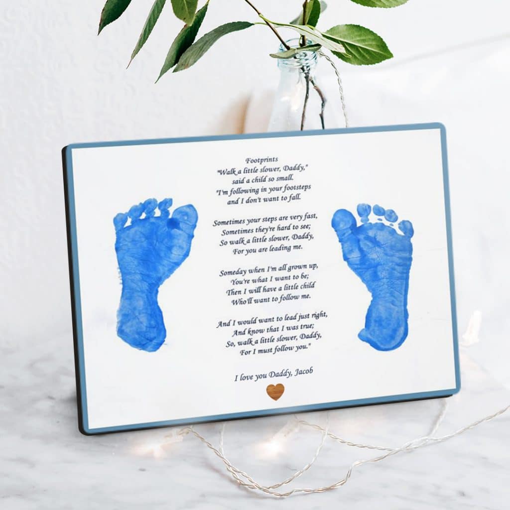 kid's painted footprints and a Father's Day poem printed on a photo panel