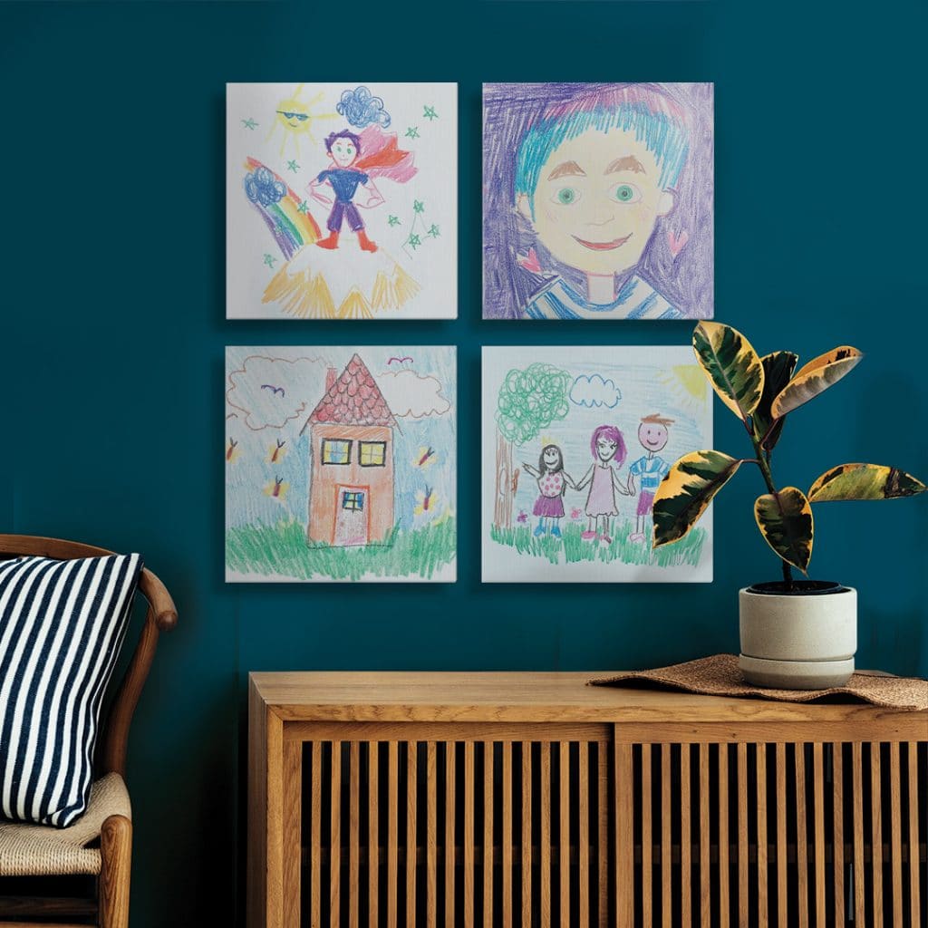 four foam tiles on the wall featuring children’s drawings make perfect Father's Day gifts