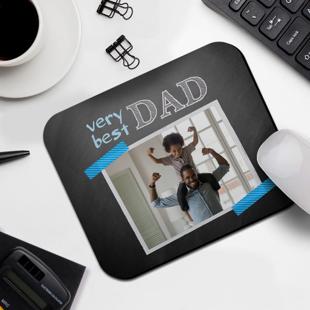 Make customised mousemat of photos to sit next Dad's keyboard