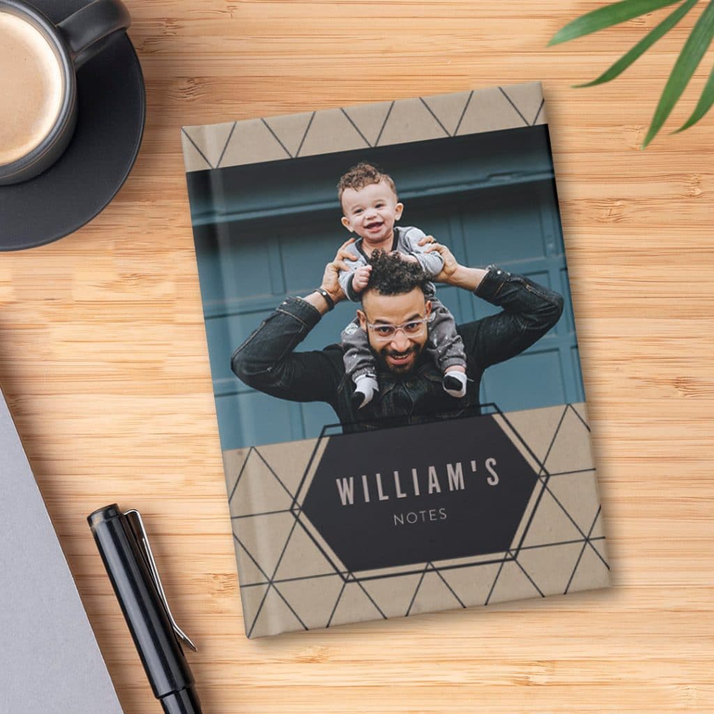 Design a personalised notebook with father and son photo printed on the cover
