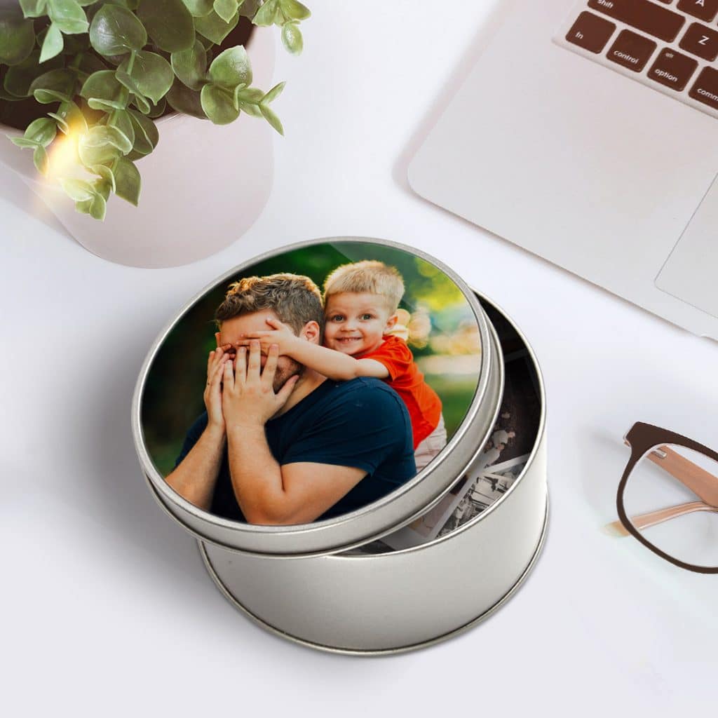 Create a personalised photo tin with a photo of Dad on the lid using the Snapfish App
