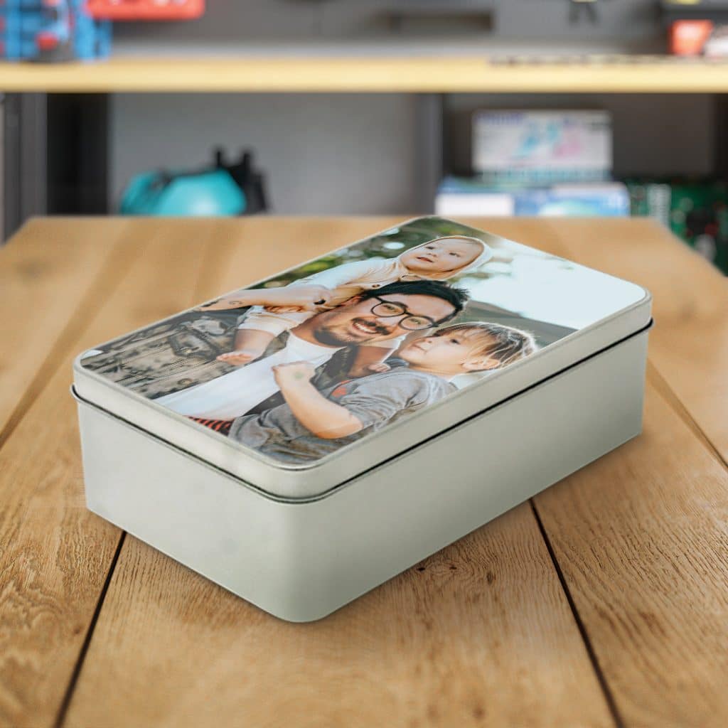 Father's day photo tin gift on wooden surface