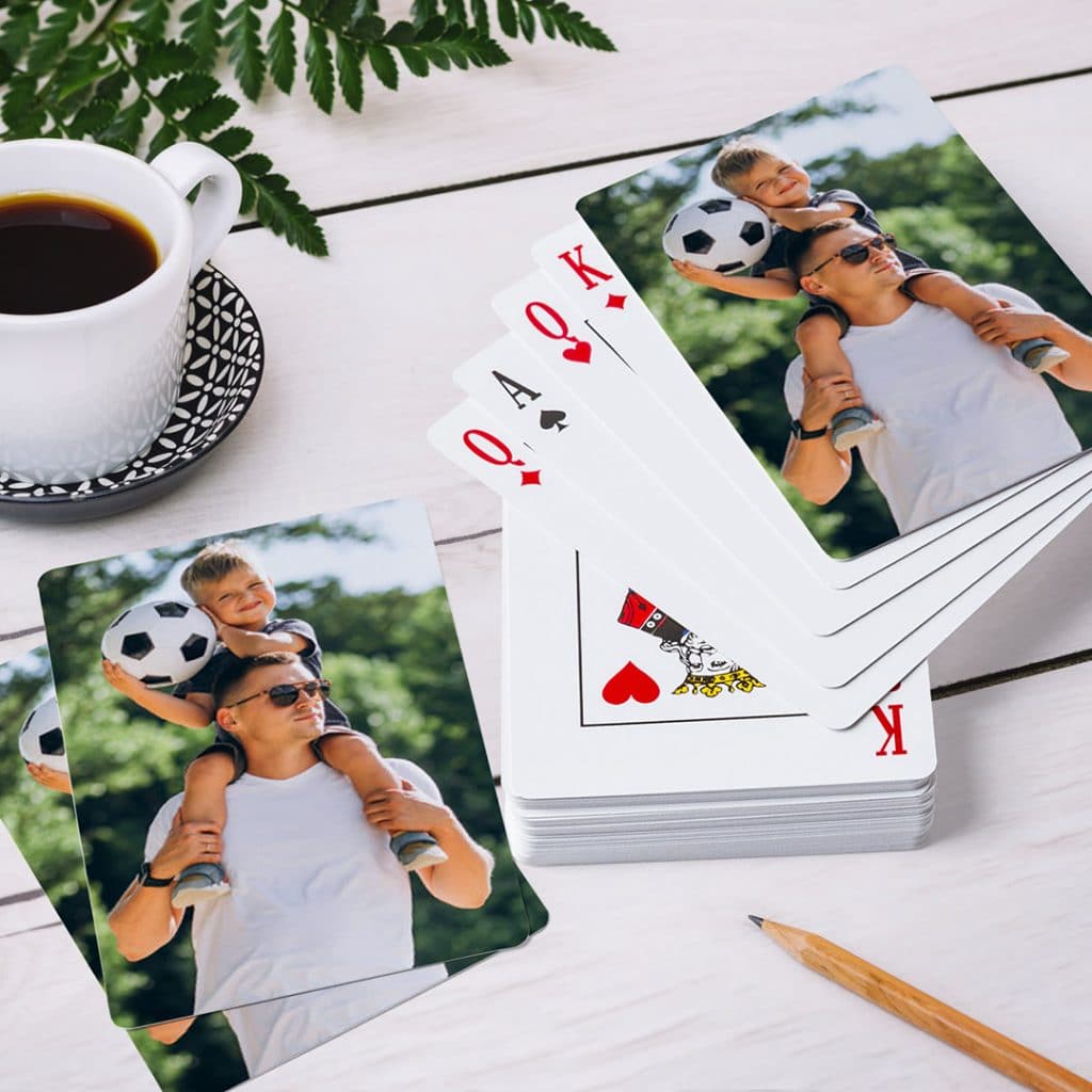 Create playing cards, printed with pictures of father and son on the back