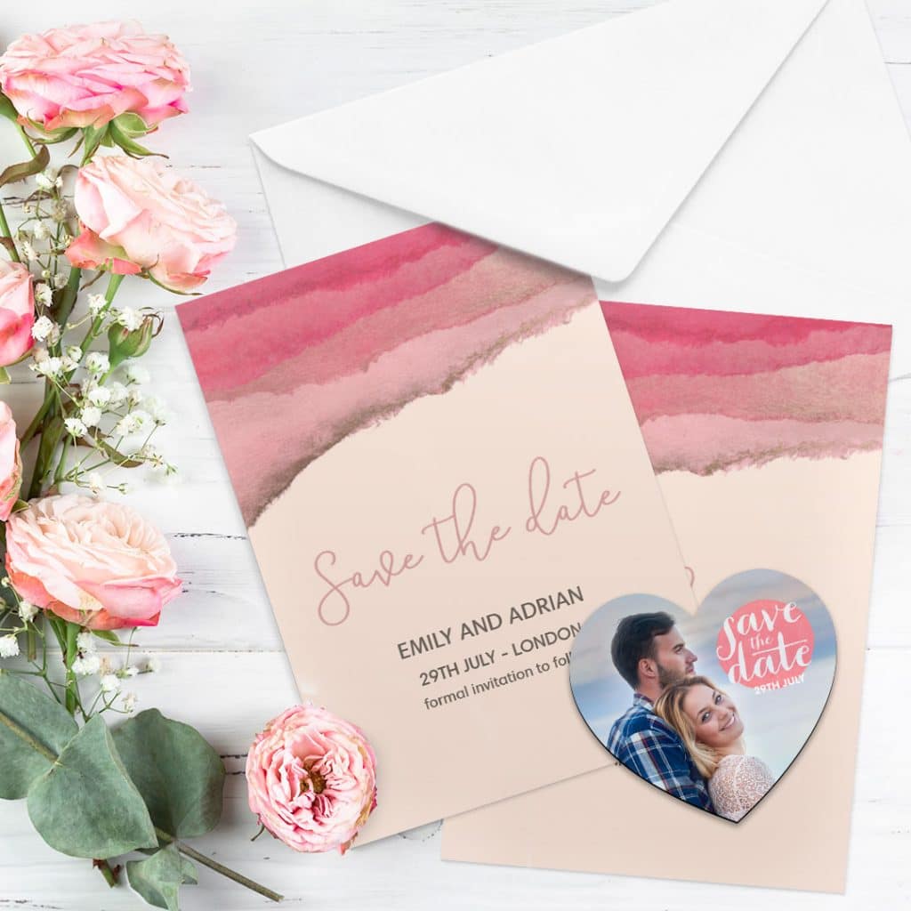 Save the date cards and a heart magnet with engagement couple image
