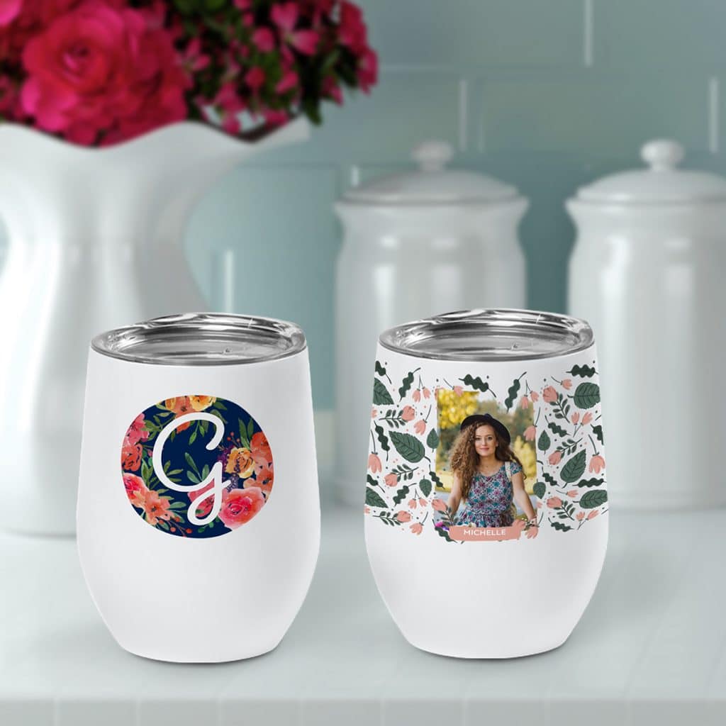 Two insulated wine cups featuring flower designs