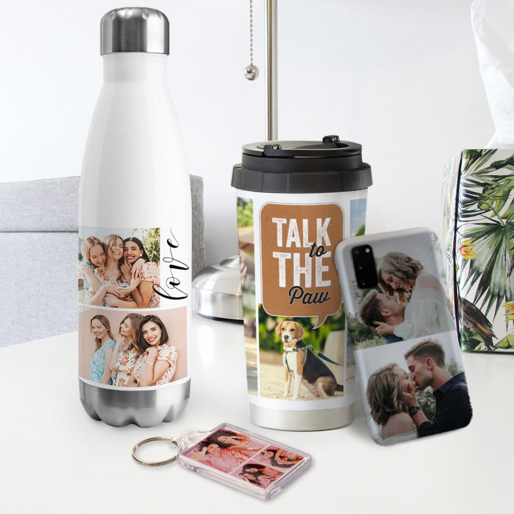 A picture collage water bottle, travel mug, phone case and a key ring on a desk