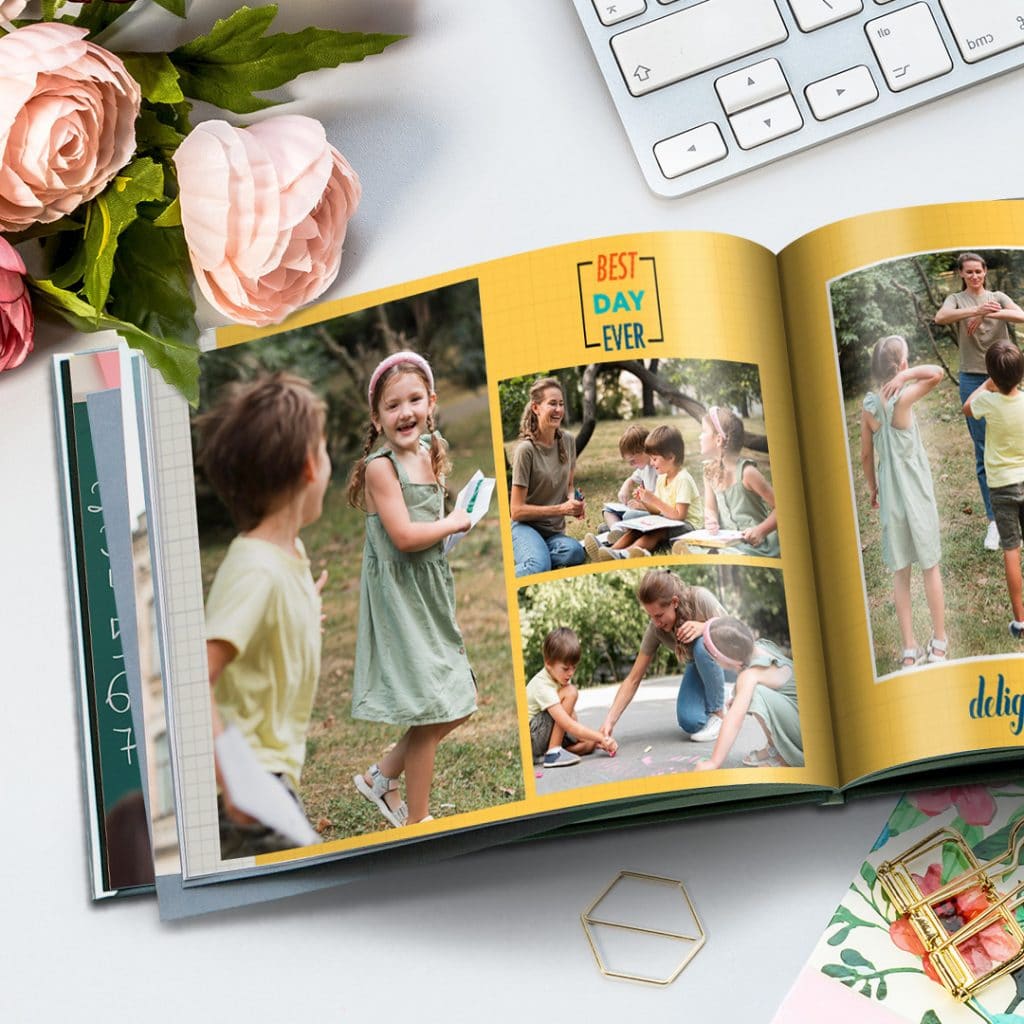 A thank you teacher photo book with images of children and their teacher playing in the park